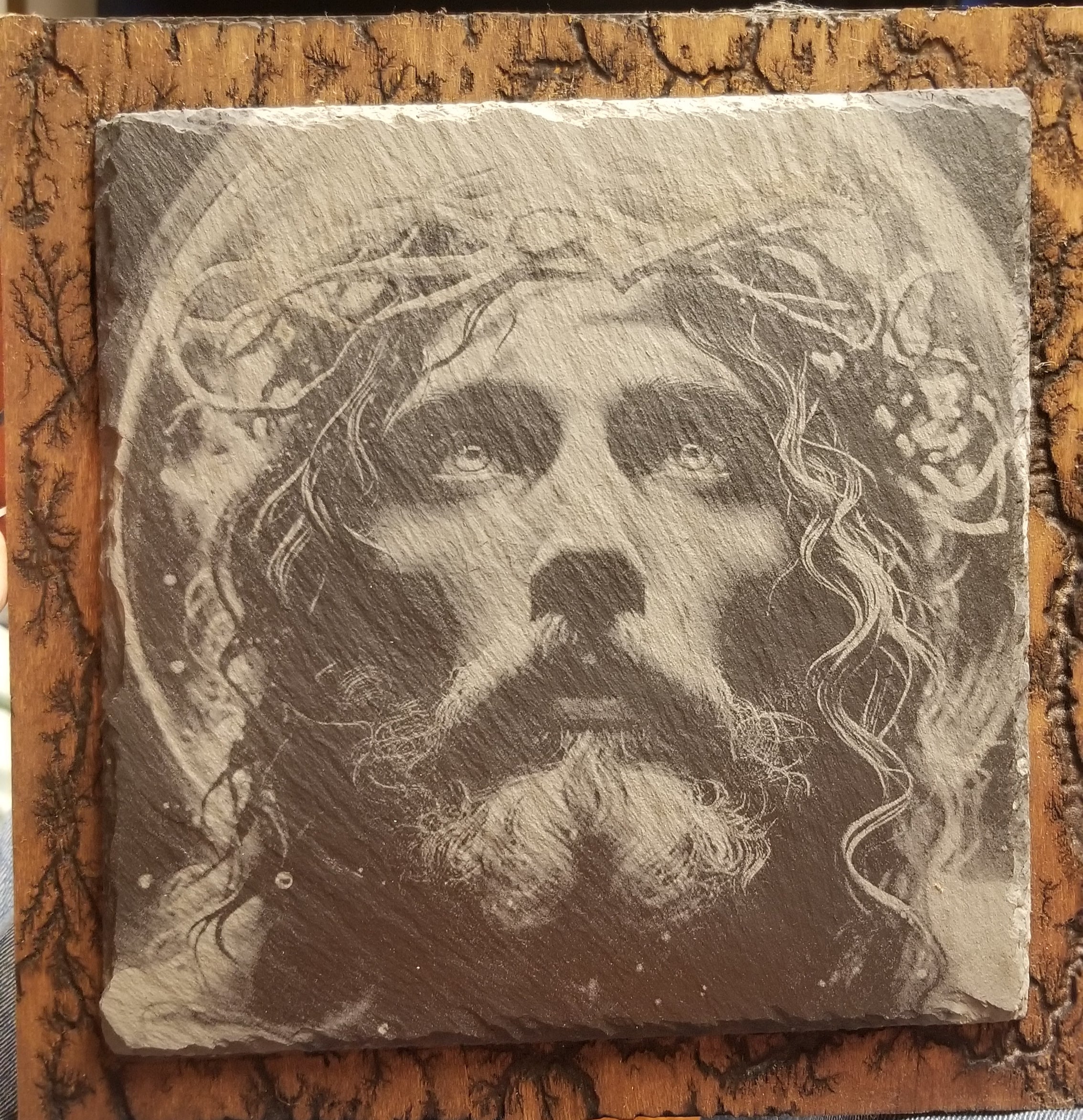 Laser Engraved Jesus on Slate – 10x10 Slate Mounted on 12x12 Fractal Burnt Wood | Handmade Christian Wall Art | Lichtenberg Burn Design